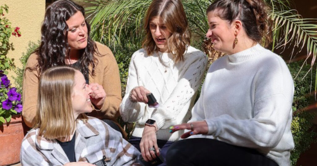 Group of women talking.